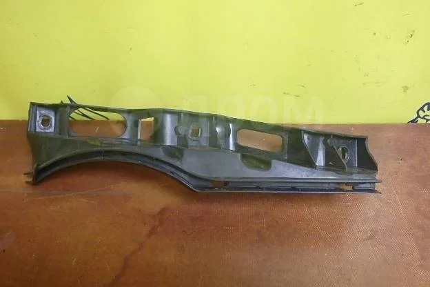 Кронштейн переднего бампера левый Volkswagen Passat B6 (2005—2010)