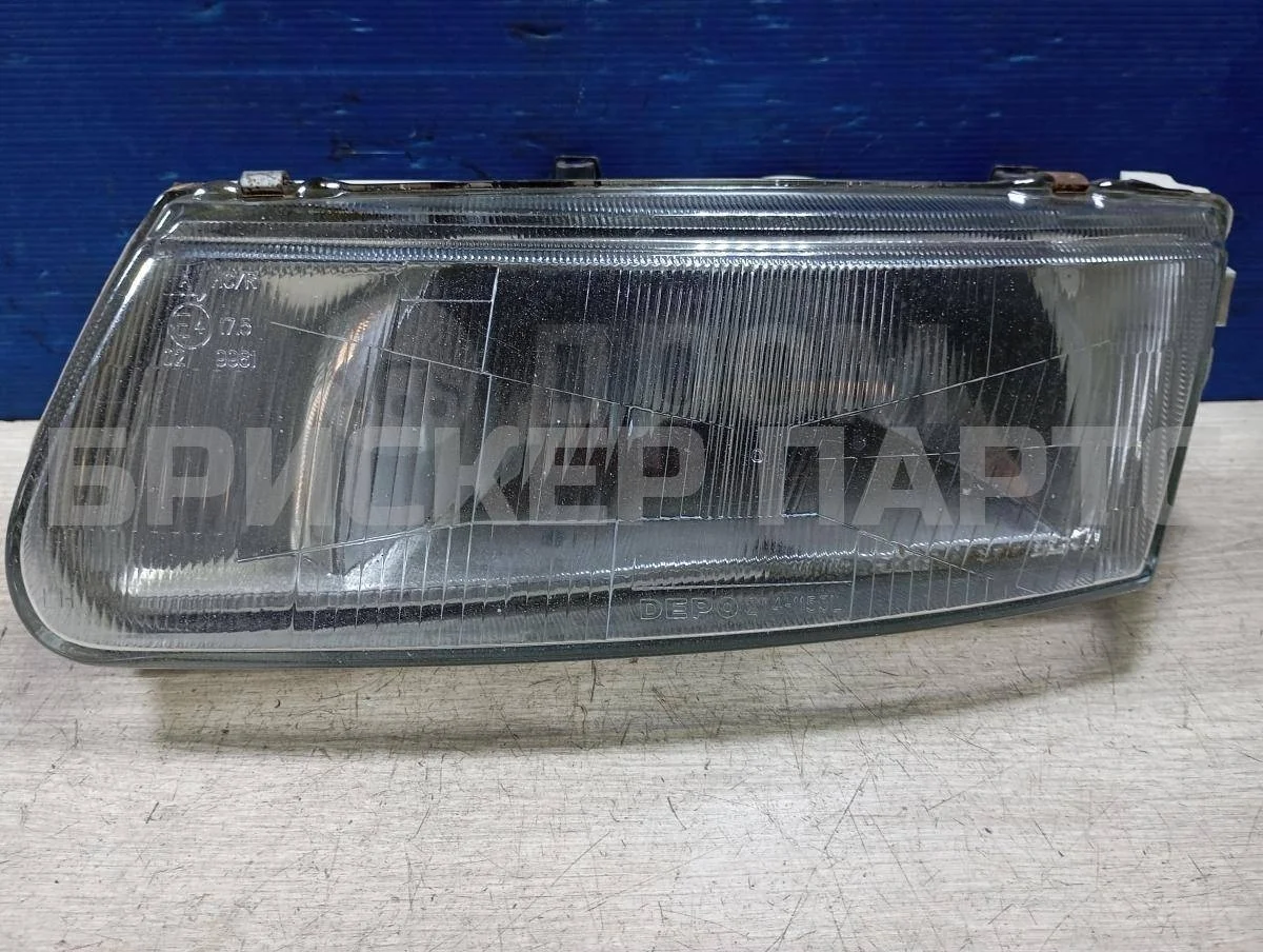 Фара левая Митсубиси 21 (L48, K48, B48)