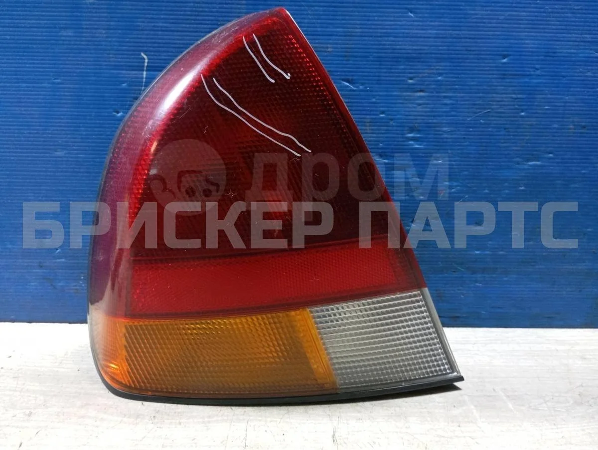 Фонарь задний левый Митсубиси 21 (L48, K48, B48)