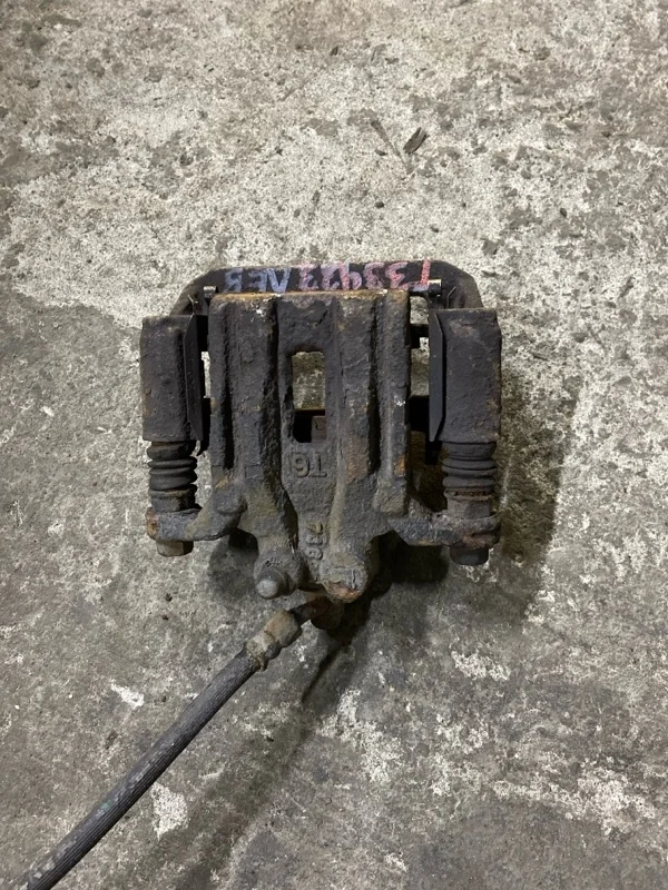 Суппорт задний левый Nissan Pathfinder (R51M) 2004-2013 2007 44011EB30A ВНЕДОРОЖНИК 2.5 D YD25