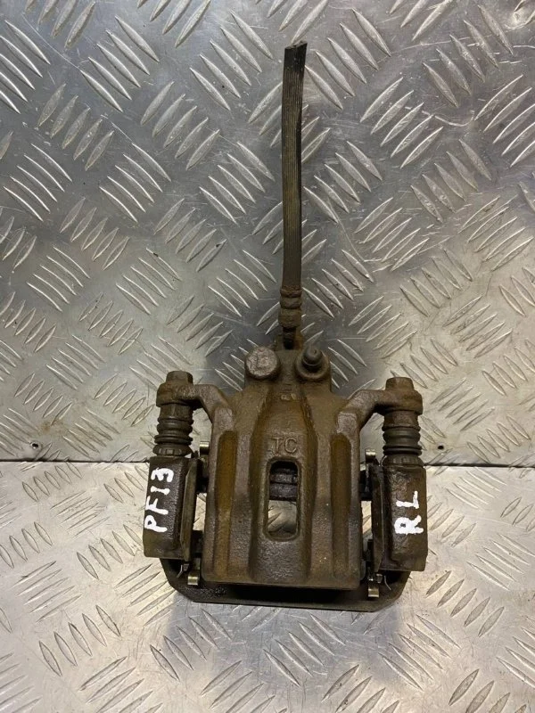 Суппорт задний левый Nissan Pathfinder (R51M) 2004-2013 2008 44011EB30A ВНЕДОРОЖНИК 2.5 D YD25DDTI