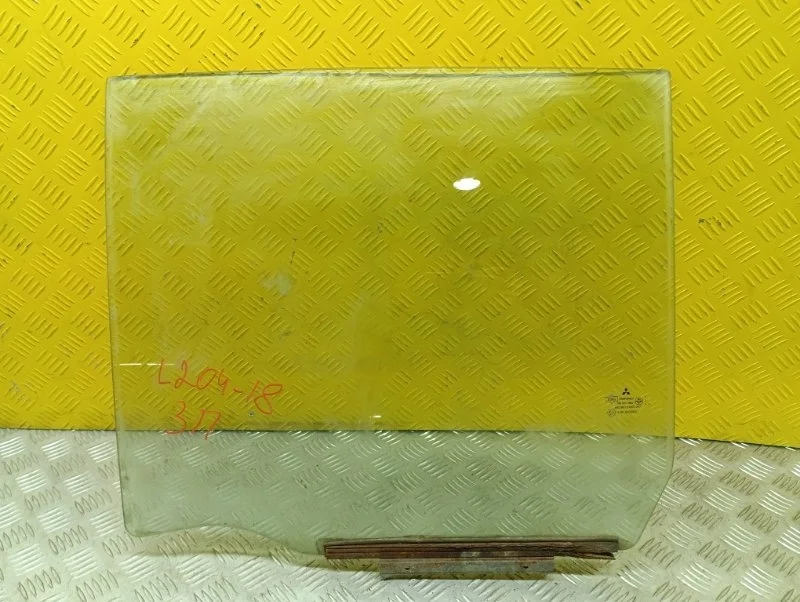 Стекло двери задней левой Mitsubishi L200 (2006-2015) 2007 5736A007 ПИКАП 2.5 D 4D56