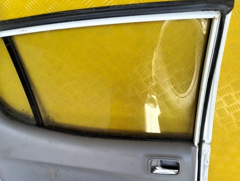Стекло двери задней левой Mitsubishi L200 (2006-2015) 2010 5736A007