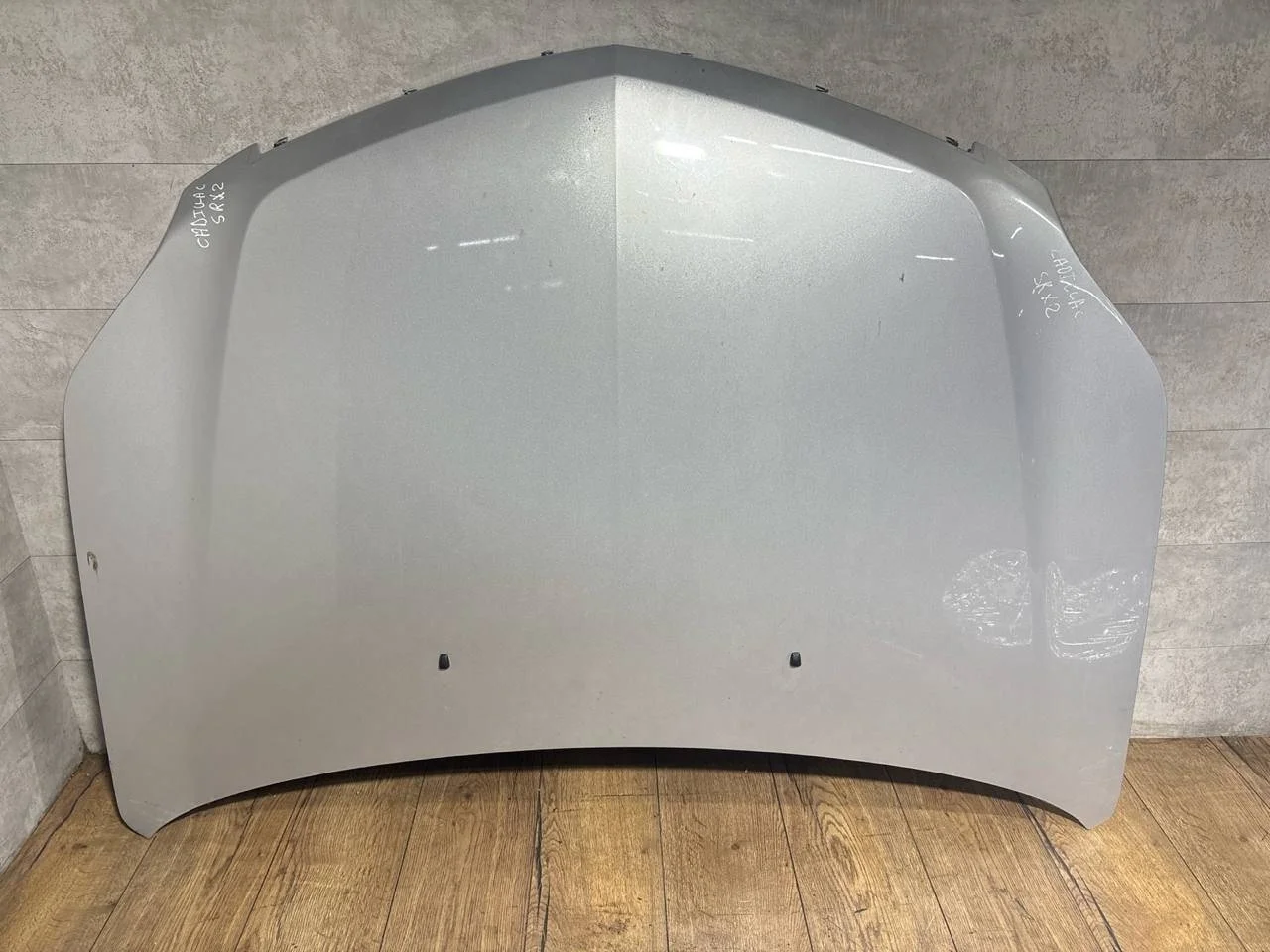 капот Cadillac SRX 2