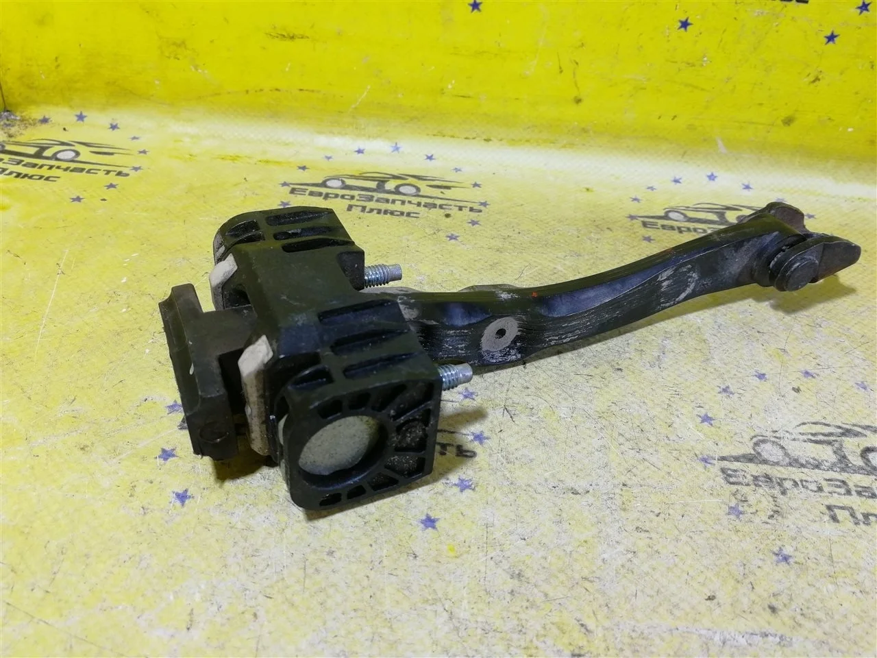 Ограничитель двери Opel Astra 13107175 H, передний