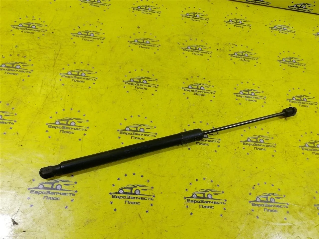 Амортизатор двери багажника Opel Zafira 13128759 B