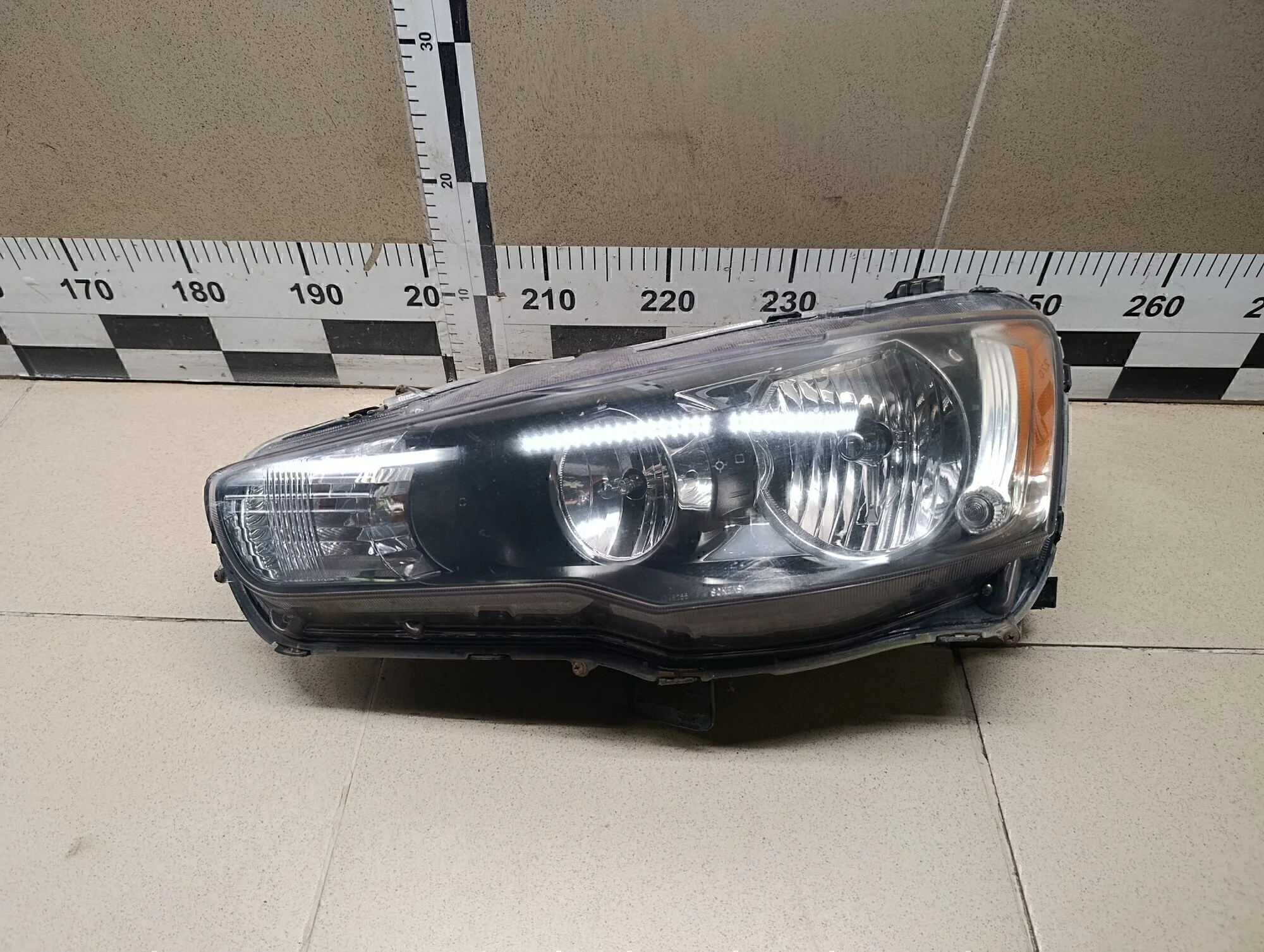 Фара левая Lancer (CX,CY) 2007>