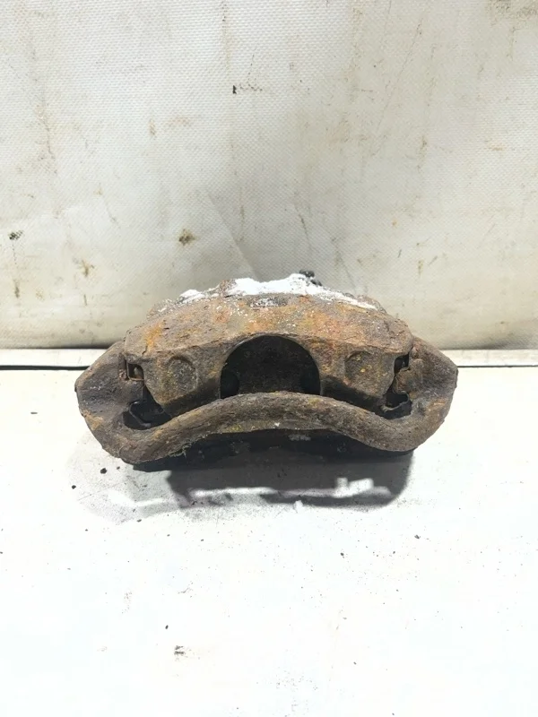 Суппорт тормозной передний левый Hyundai Getz