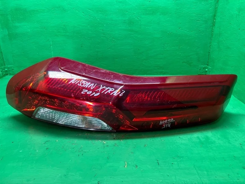 Фонарь Nissan X-Trail 2010-2015 265553UB0A T31, левый