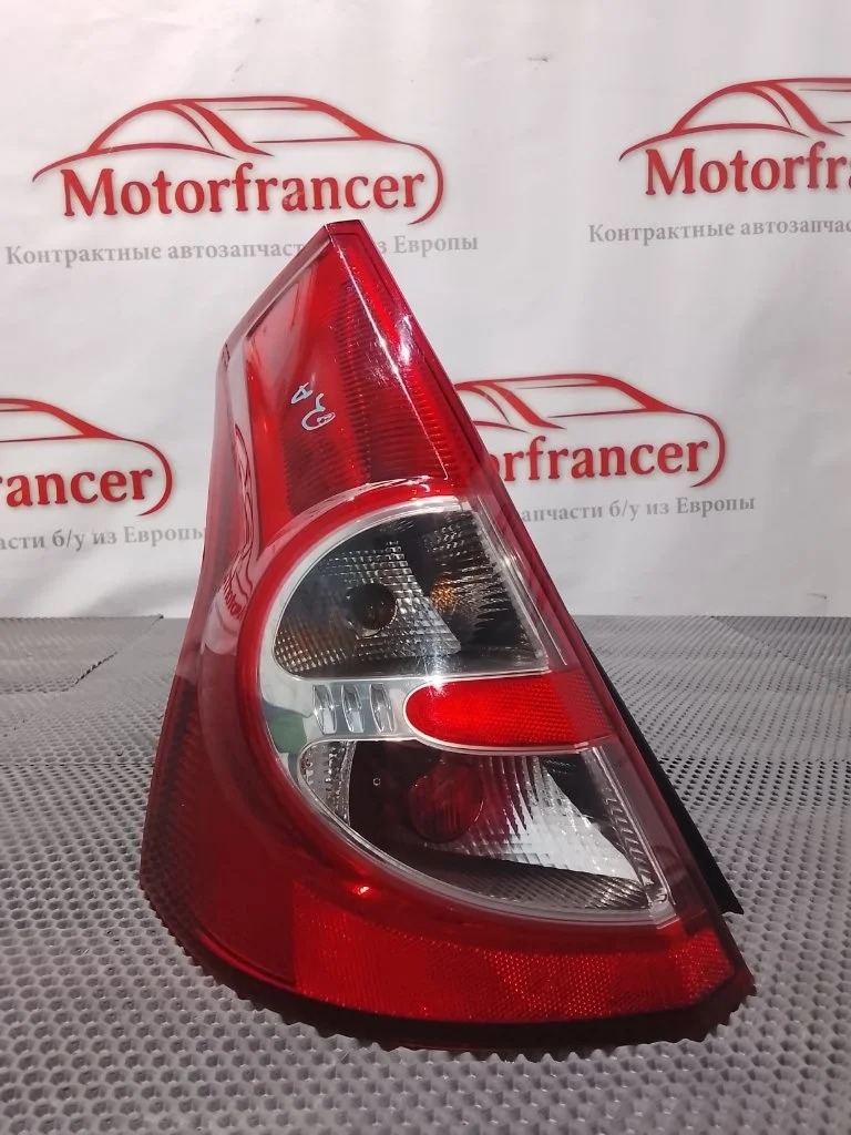 Фонарь задний Renault Sandero 2009 8200734825 1, левый