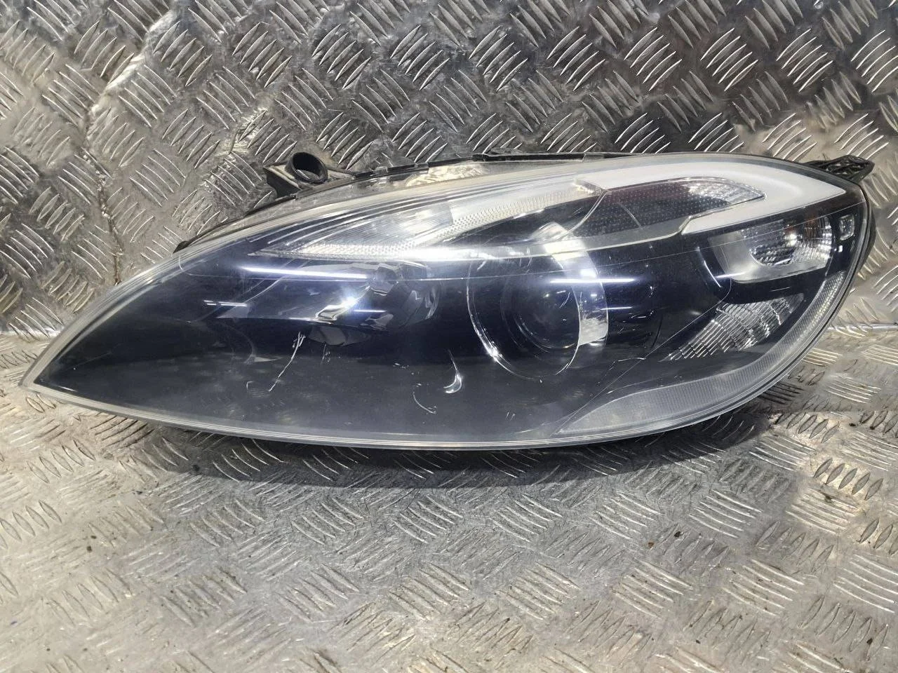 фара левая Volvo V40 2