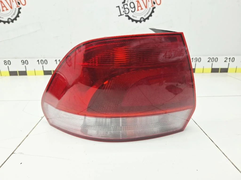 Фонарь задний левый Volkswagen Polo 5