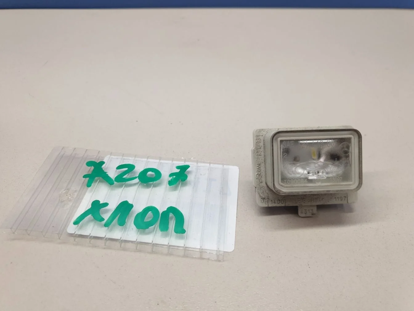 Фонарь подсветки номерного знака для Mercedes E-klasse W212 2009-2016