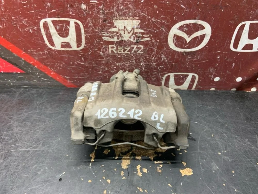 Суппорт задний левый для Mazda 3 BL 2008-2013