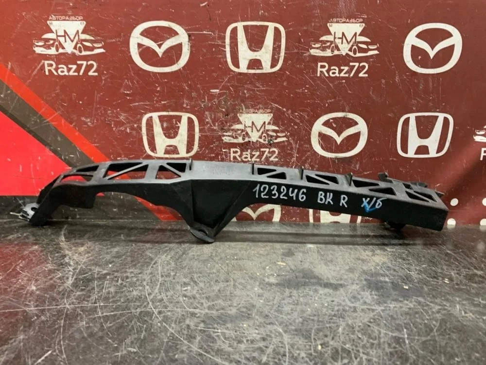 Кронштейн фар правый для Mazda 3 BK 2002-2009