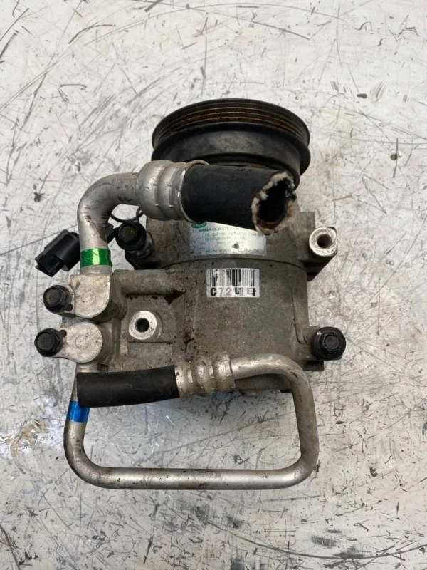 Компрессор кондиционера Hyundai Tucson 977012D700 G4GC