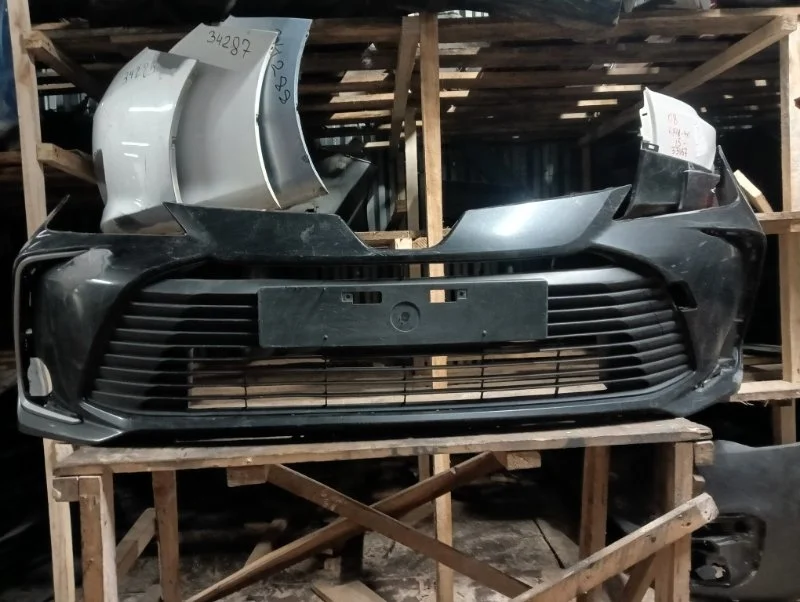 Бампер Toyota Corolla 2018-2021 5211902Q10 210, передний