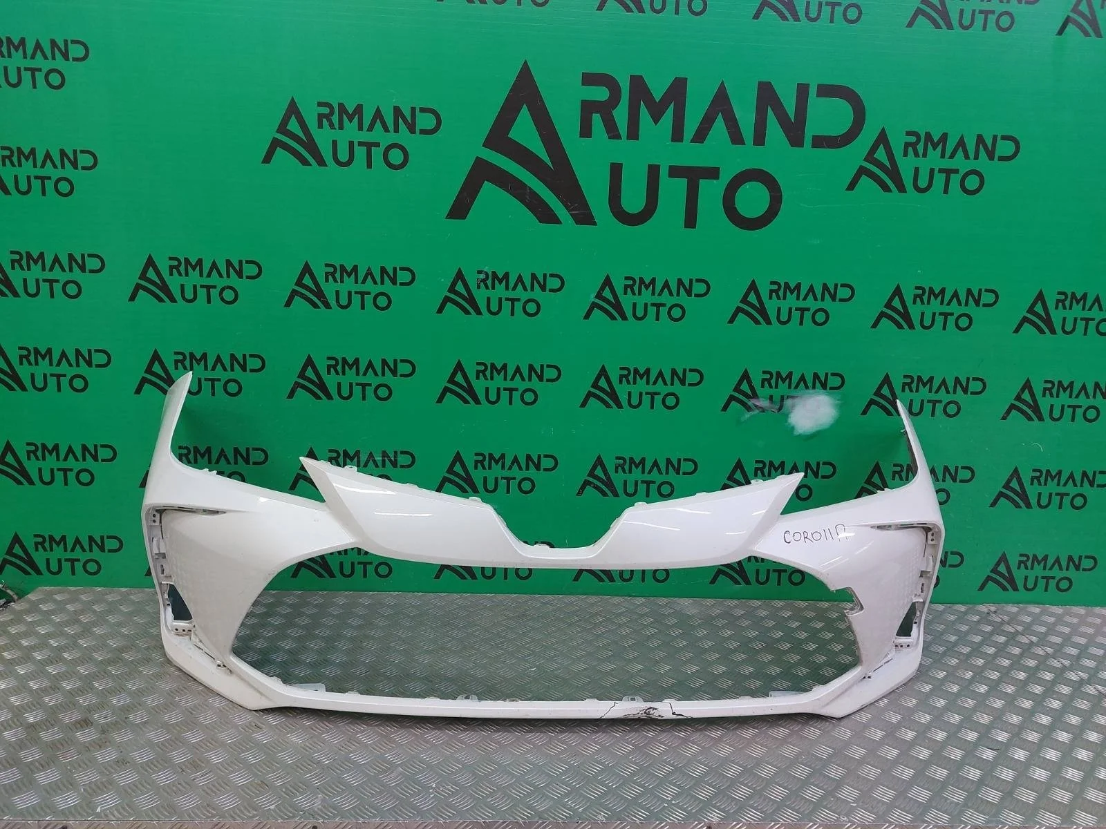 Бампер Toyota Corolla 2018-нв 12 E210