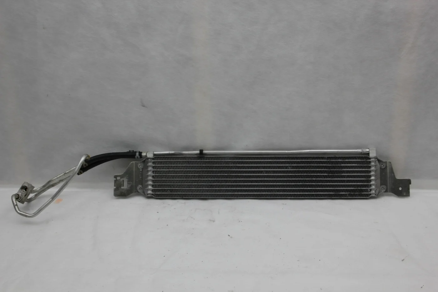 Радиатор АКПП (маслоохладитель) Опель Астра J