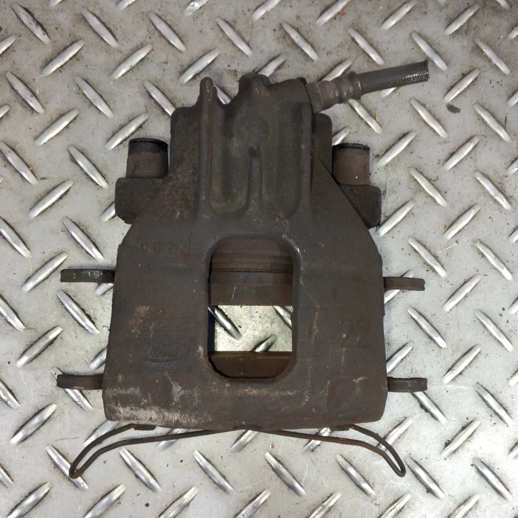 Суппорт тормозной Ford Focus 4346373 1, передний левый