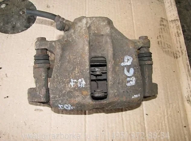 Суппорт передний правый Volkswagen Passat B5+