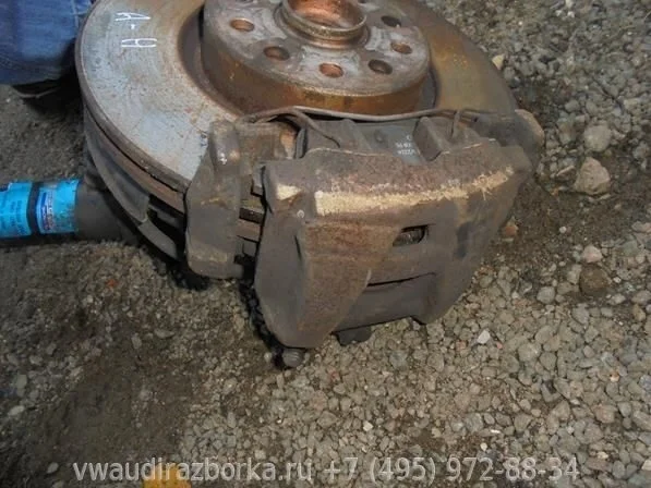 Суппорт передний правый Volkswagen Tiguan