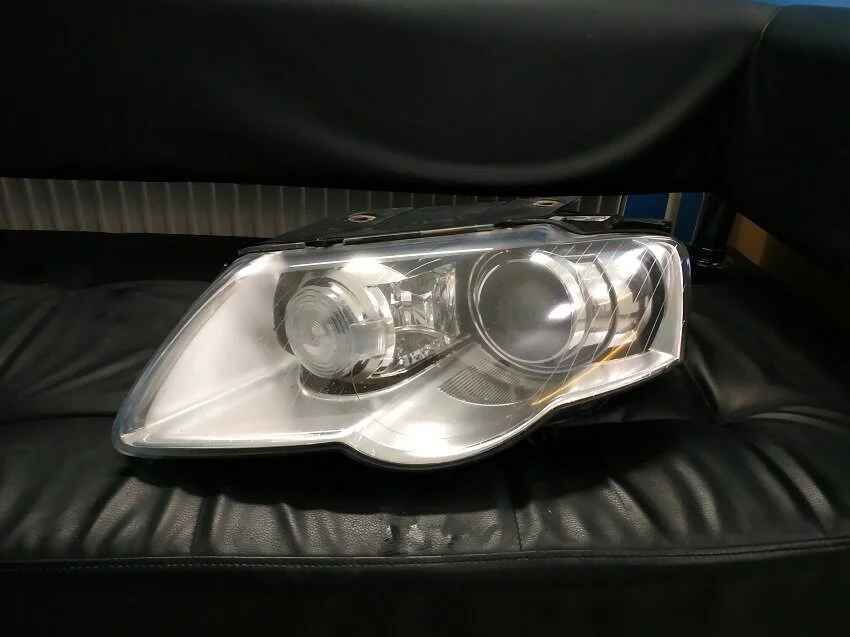 Фара передняя левая Volkswagen Passat B6 биксенон адаптив