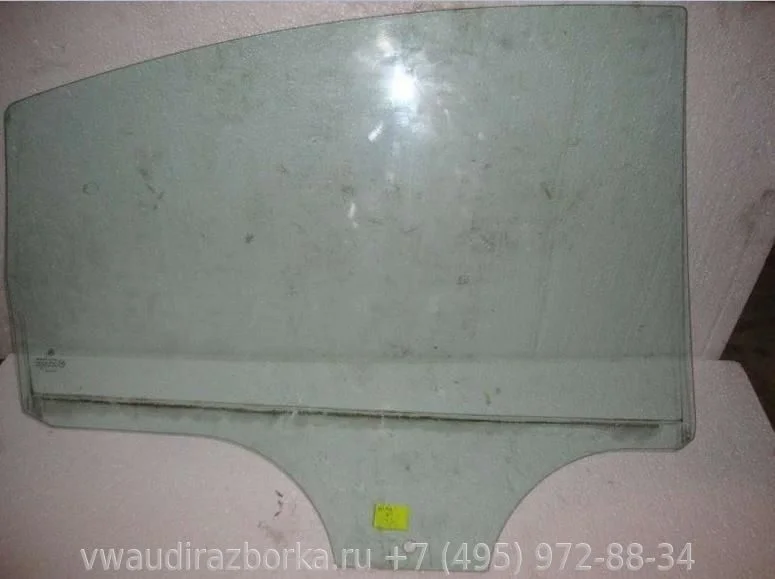 Стекло задней левой двери Volkswagen Passat B5+