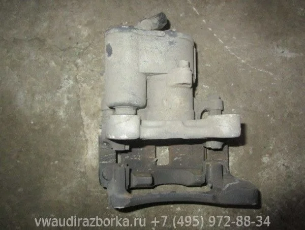 Суппорт задний левый с моторчиком ручника Volkswagen Passat B7