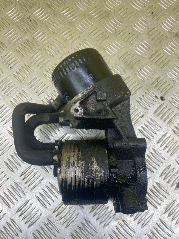 Корпус масляного фильтра Nissan Navara (D40) 2004-2015 2010 15238EB30B ПИКАП 2.5 D YD25DDTI