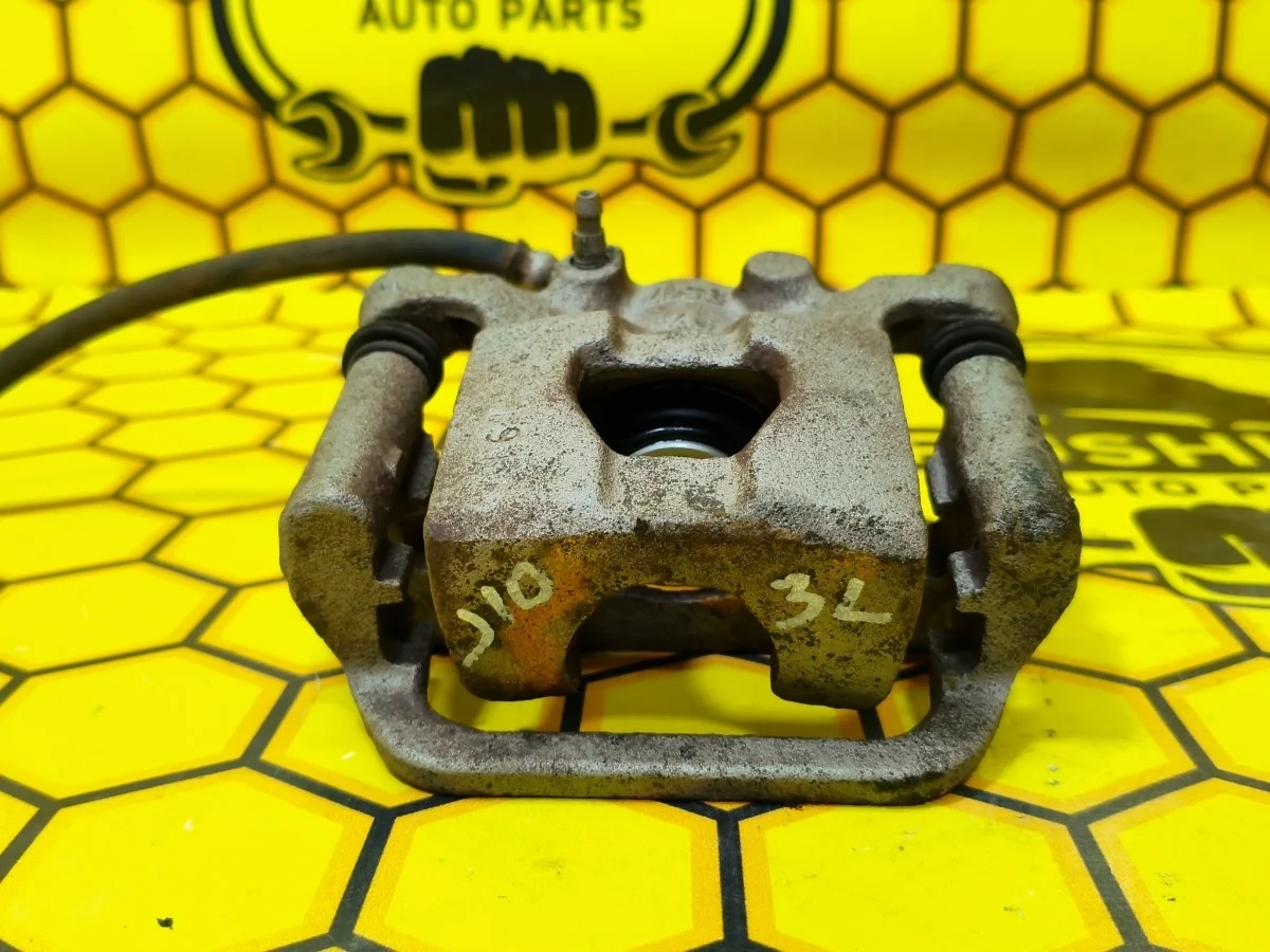 Суппорт Nissan Qashqai 2007 44011EM11A J10 MR20DE, задний левый