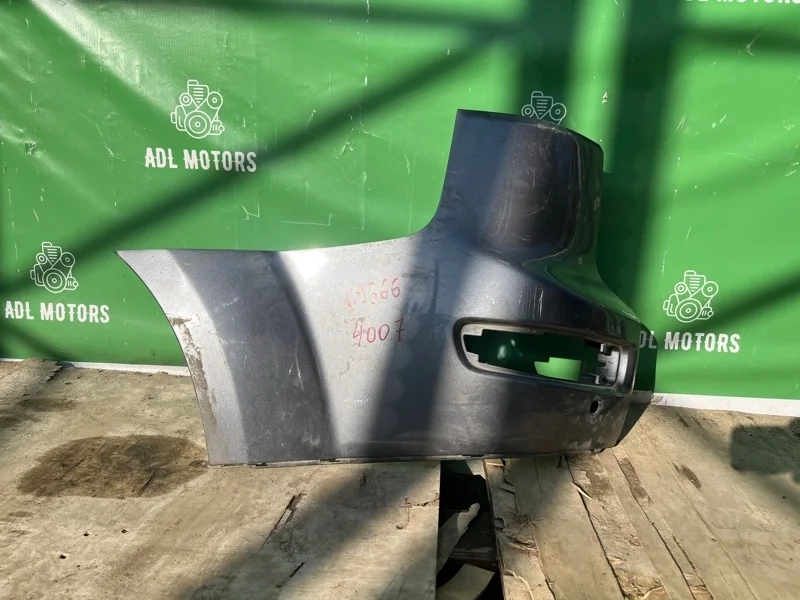 Клык бампера Peugeot 4007 2007-2012 7410EZ, задний левый