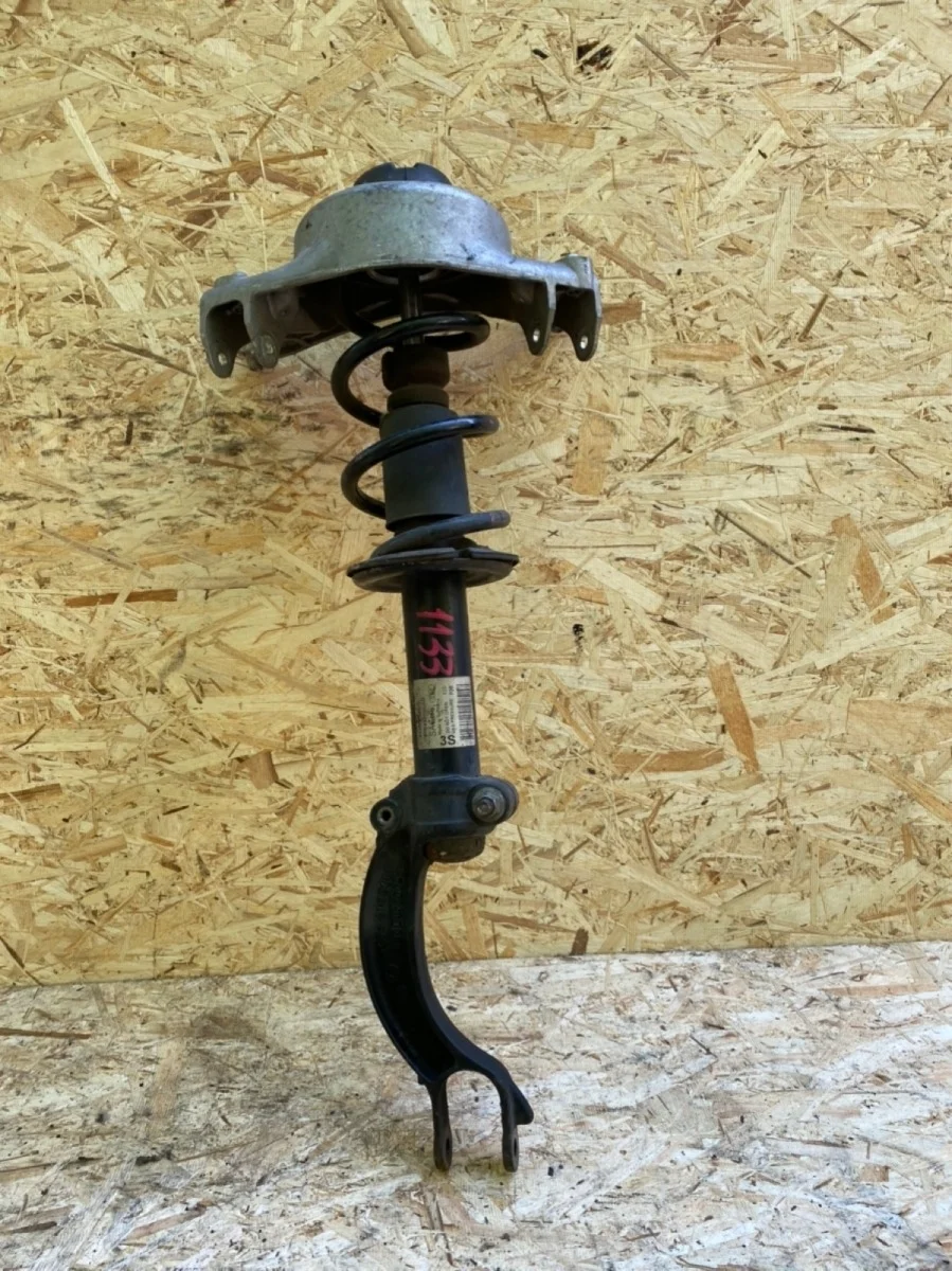 Стойка амортизатора AUDI A5 2007+ 8T0413031AD 8T, левая