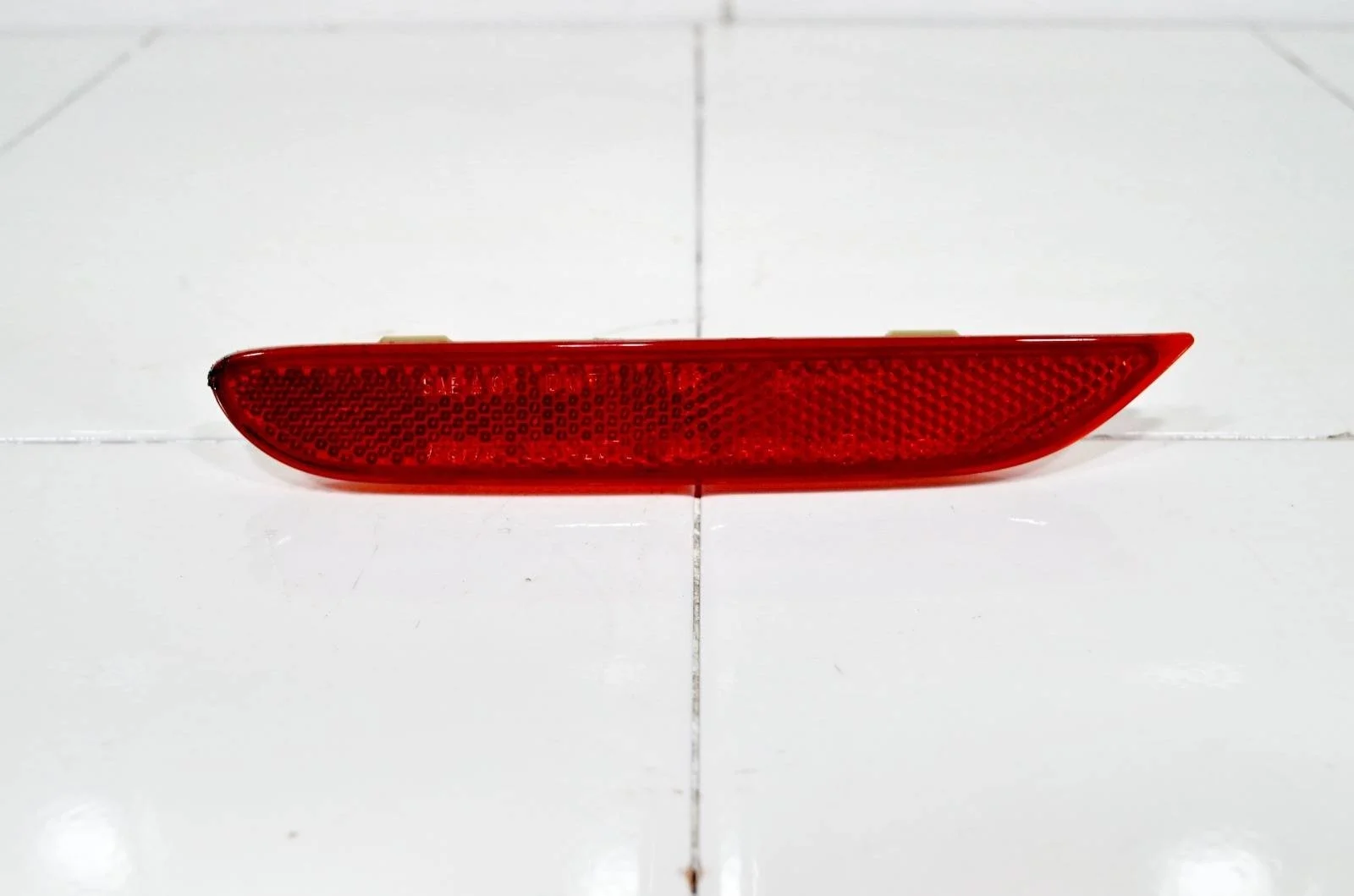 Отражатель NISSAN QASHQAI 2013+ 26565JJ90A J11, задний левый