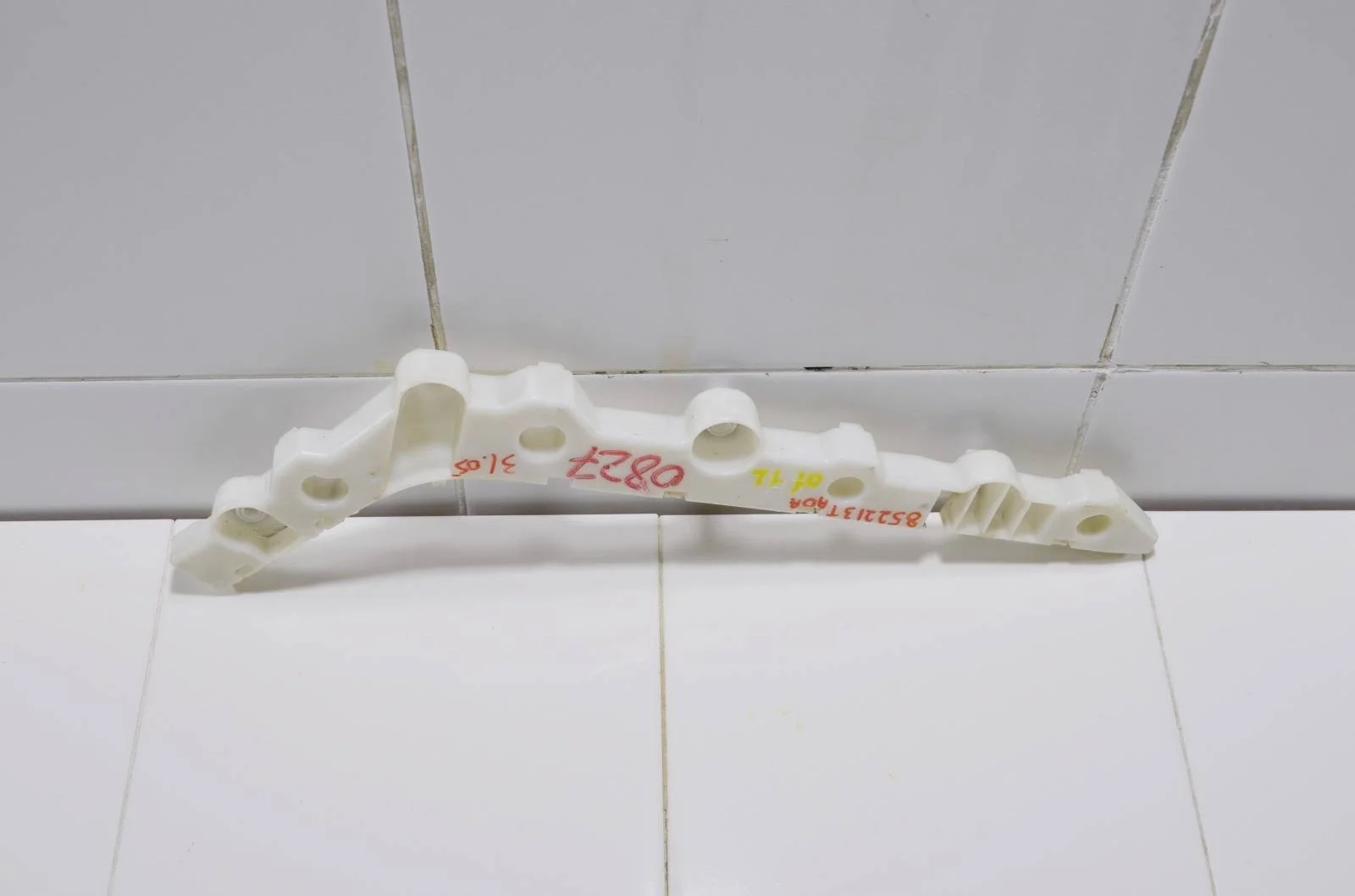 Кронштейн бампера NISSAN ALTIMA 852213TA0A L33, задний левый