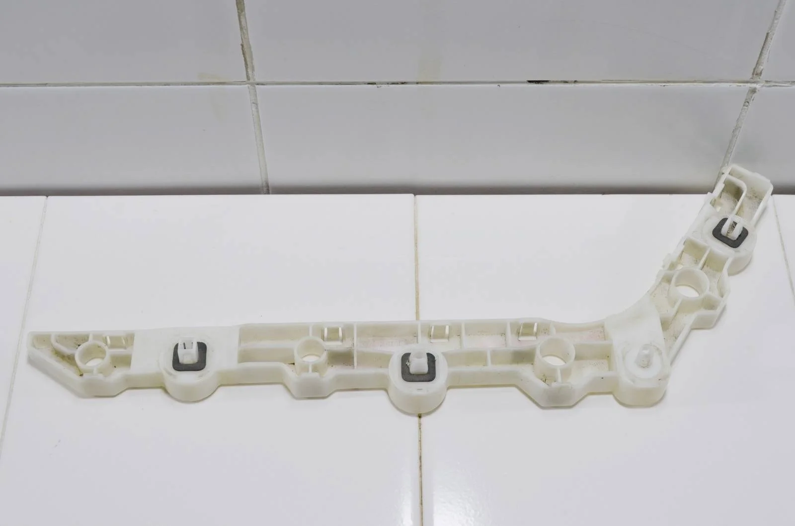 Кронштейн бампера NISSAN ALTIMA 852203TA0A L33, задний правый