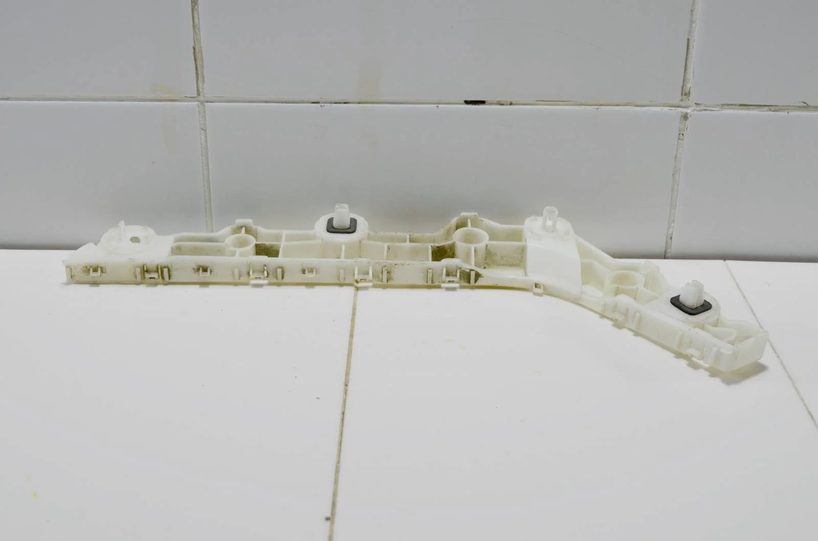 Кронштейн бампера NISSAN ALTIMA 852213TA0A L33, задний левый