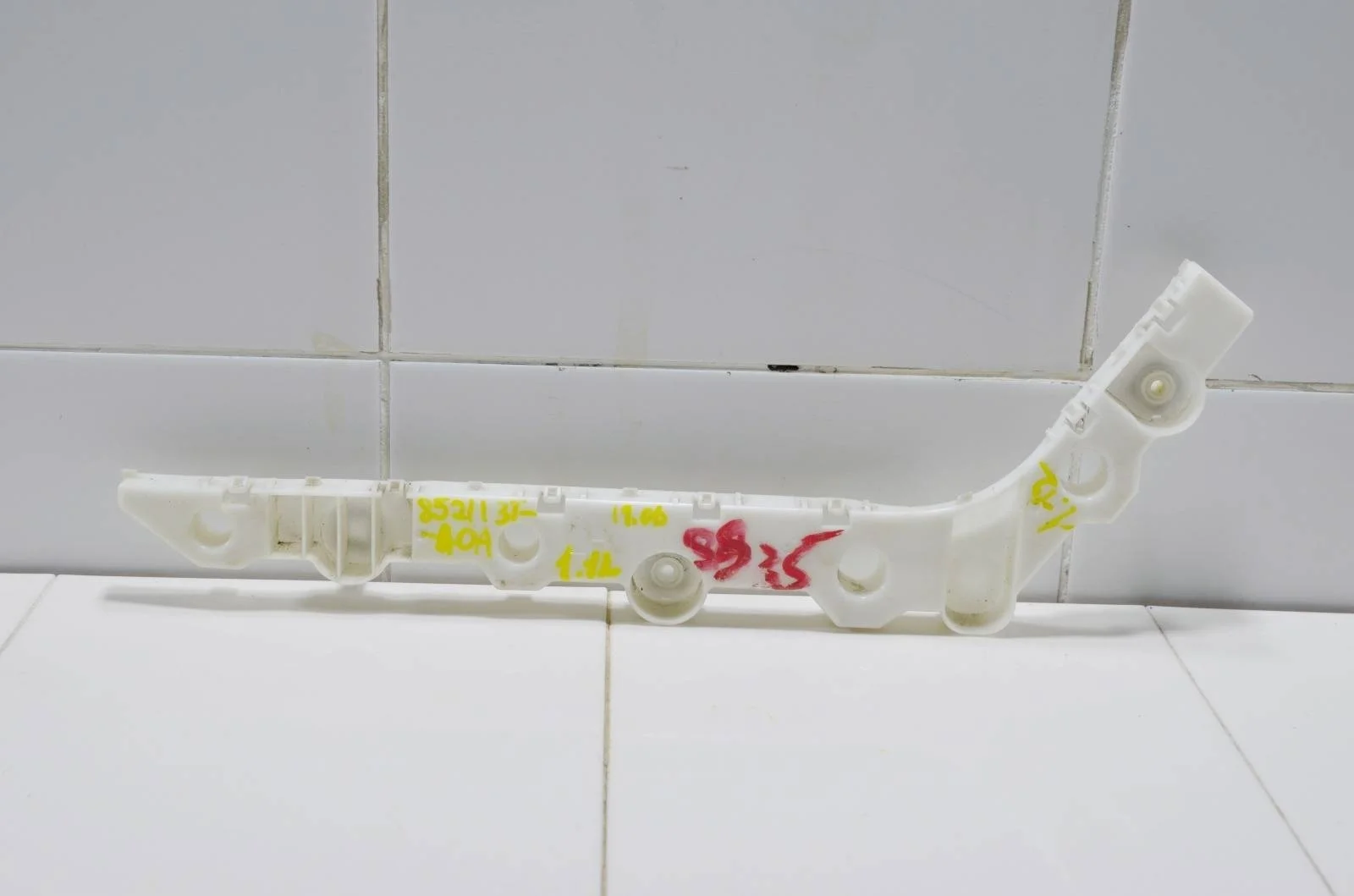 Кронштейн бампера NISSAN ALTIMA 852213TA0A L33, задний левый