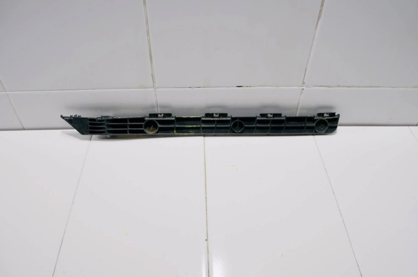 Кронштейн бампера Toyota Camry 5215833010 ACV40, задний левый