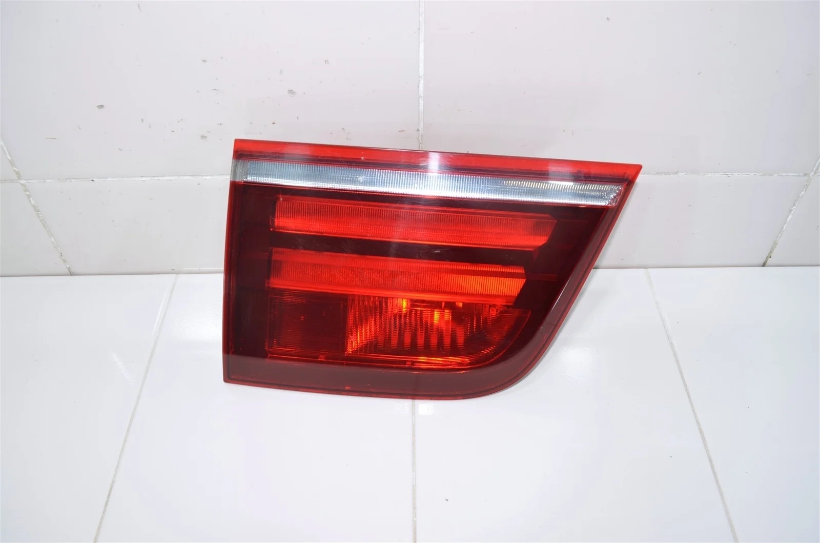 Фонарь BMW X5 2013 63217227793 E70, левый