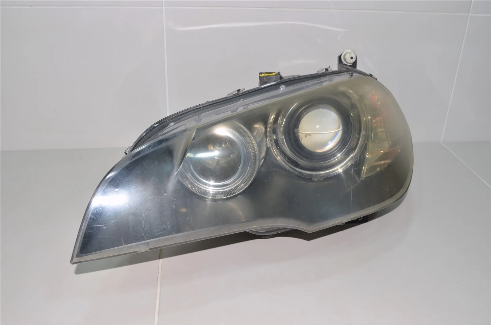 Фара BMW X5 2006-2010 63117289001 E70, левая