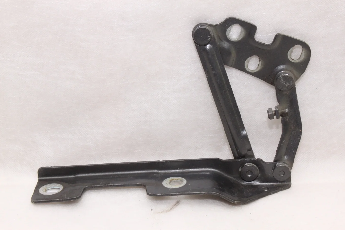 Петля капота левая Опель Астра J (Джей)