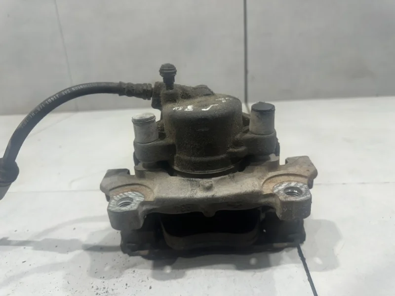 Суппорт тормозной Volvo S80 36000151, передний левый