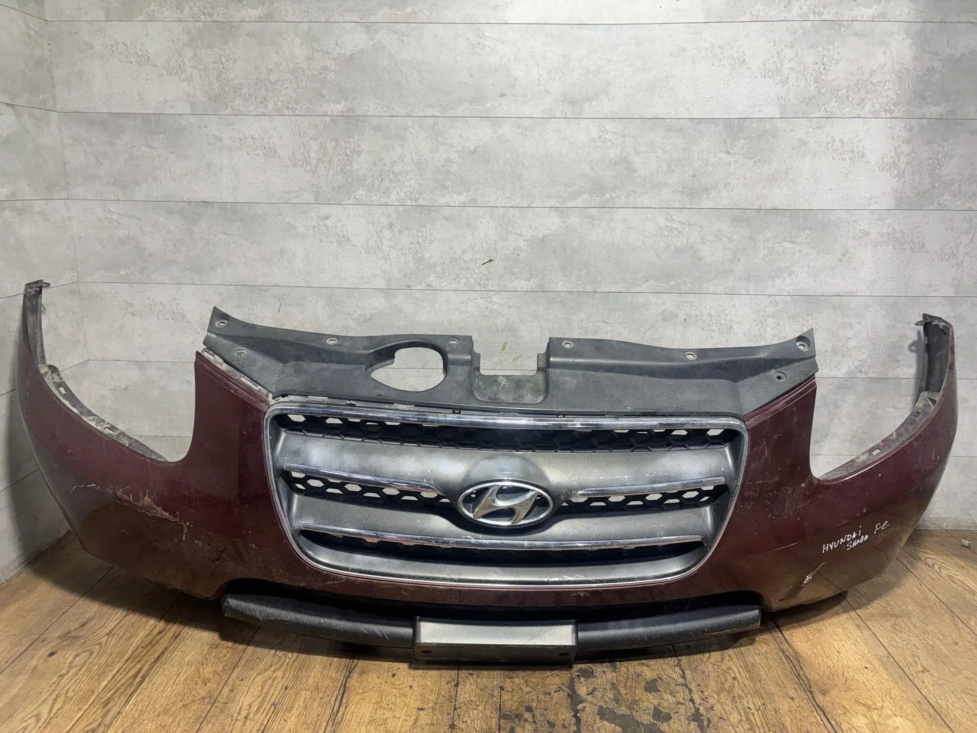 бампер передний Hyundai Santa Fe 2  (CM)   черный