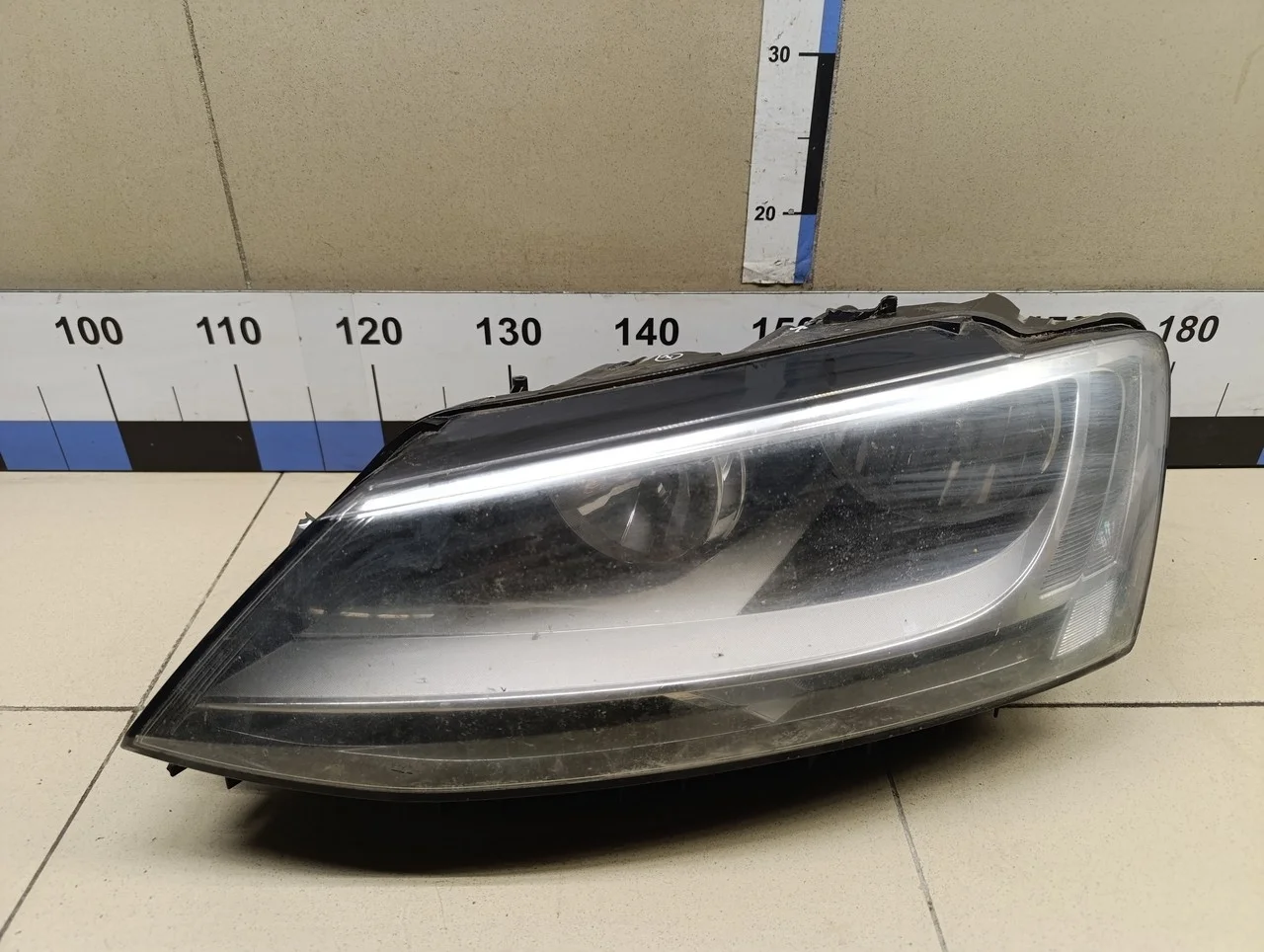 Фара левая Jetta 2011>