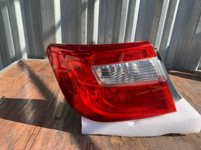 Фонарь Toyota Camry 2011-2014 8156133550 50, левый