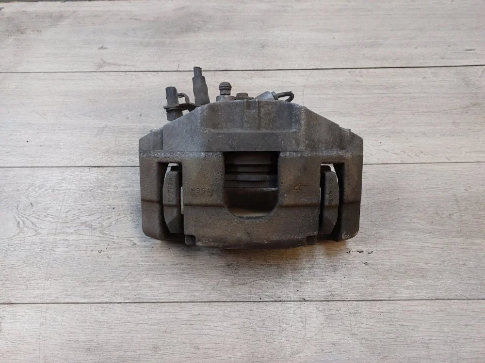 Суппорт тормозной передний Audi A6 C6 (2004—2008)