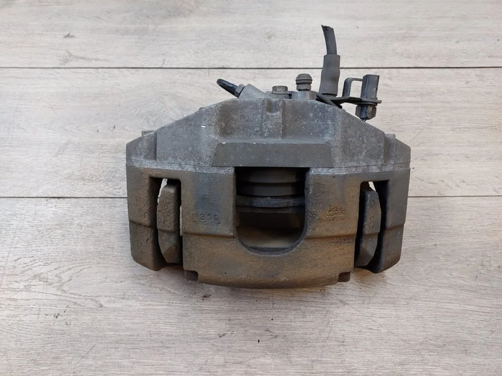 Суппорт тормозной передний Audi A6 C6 (2004—2008)