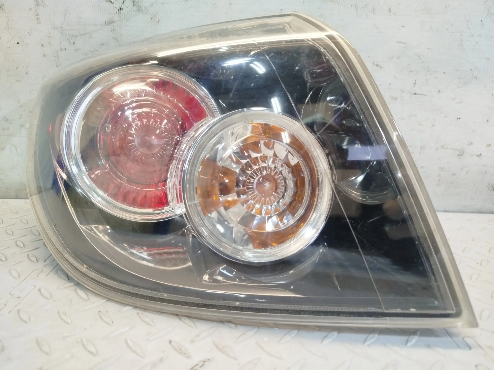 ФОНАРЬ MAZDA ЛЕВО BR5S51160B KB1390