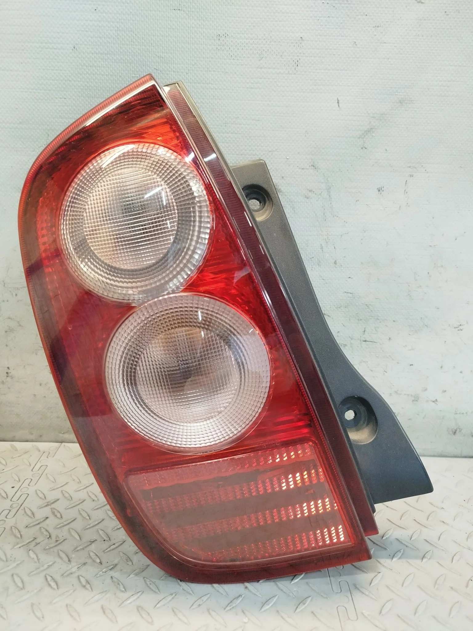 ФОНАРЬ NISSAN ЛЕВЫЙ 26555AX025 KB1363